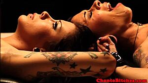 Lezdom mistress ruling over submissives