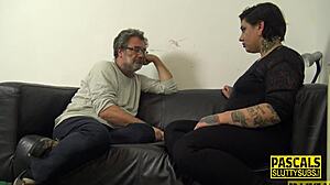 Tattooed chubby submissive feels intense pleasure as she's fingered to squirting orgasm and receives cum in mouth