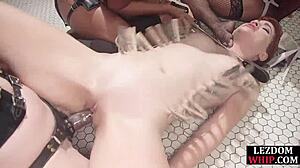 Ebony And Redhead Babes Spank And Strapon In BDSM Group