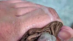 Watch the twink get a handjob and cum in the shower