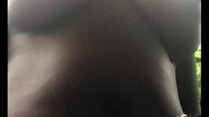 Wow, this ebony model fingers her pussy outdoors in the forest!