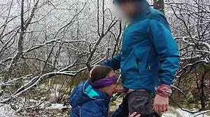 Petite brunette swallows cum outdoors by mountain river