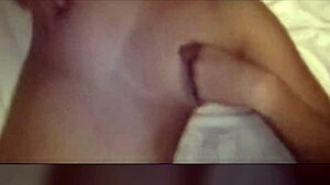 Amateur Latina rubs her big tits and pussy in homemade video
