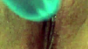 look at teen playing with wet pussy using toys