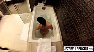 Sexy Jezebelle Bond films herself in a relaxing bath