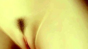 Momiji teases nude with ponytail in gravure studio