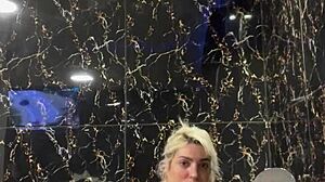 sexy blonde with tattoo invites you to join her in the wet jacuzzi