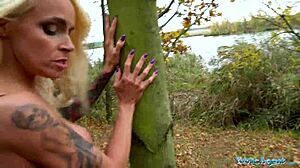 Want to see this tattooed german milf fucked hard against the tree?