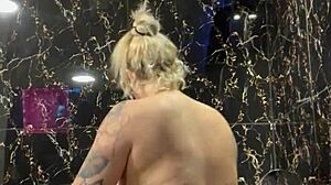 sexy blonde with tattoo invites you to join her in the wet jacuzzi