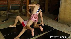 Gay wrestler enjoys intense matches with partners