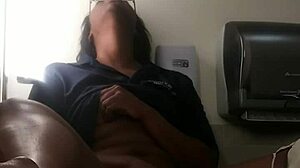 Ebony babe masturbates on bathroom counter, fingering her big ass close-up.