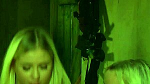 Madame fingers bent-over lesbian slave's ass