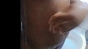 Cyndy blackslave takes a shower under master maledom bdsm control with ebony tits