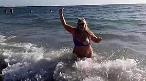 hot milf masturbates on beach feeling so horny outdoors