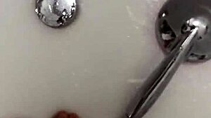 I slowly remove my nylon stockings before a steamy shower tease.