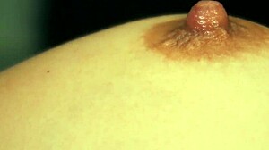 teacher babe licks and sucks teen's big tits close-up