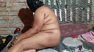 Indian girl with natural tits intensely fingering herself to orgasm