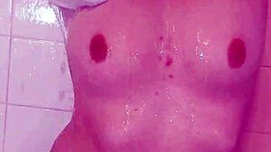 Watch This Petite Teen Finger Pussy In Shower Striptease!