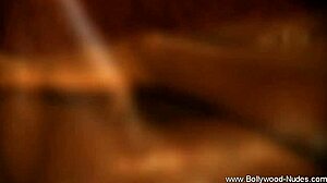 Indian brunette teases with striptease