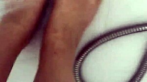 I slowly remove my nylon stockings before a steamy shower tease.