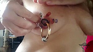 Horny Milf Tattoos Huge Pierced Nipples Close-Up!