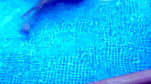 Big natural tits bouncing in the pool.