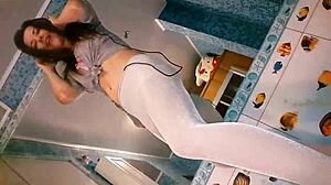 sexy brunette posing in bathroom for close-up