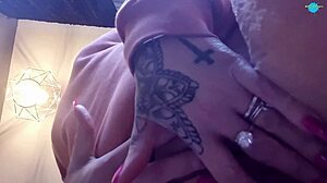 she spreads her shaved pussy for close-up play