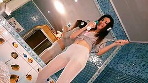 sexy brunette posing in bathroom for close-up