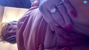 she spreads her shaved pussy for close-up play