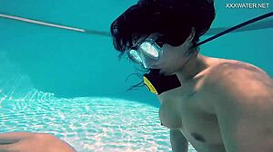 Brita Piskova masturbates her tight pussy underwater in pool