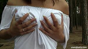 busty teen rita masturbates outdoors under the sun