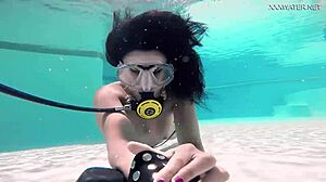 Brita Piskova masturbates her tight pussy underwater in pool