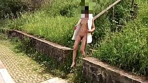 Walking around in my white outfit, flashing publicly for skysexfree