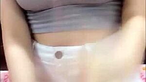 em nhung hani shows tits and ass webcam