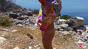 hey, watch this kinky mom pissing outdoors with pierced nipples!