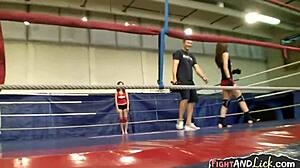 Wrestling lesbians strapon fuck in match