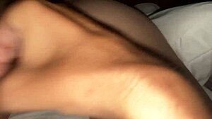 Hot chick intensely teasing shaved pussy with buttplug and toys