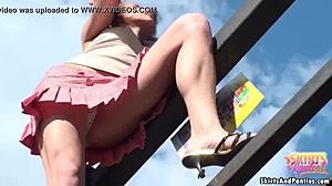 Babe flashes panties under skirt in upskirt view, amateurs watch excitedly!