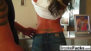 Watch Brooke Brand get a tattoo in the shop