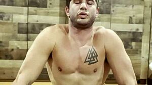 Muscular Bodybuilder Stretches Sensually