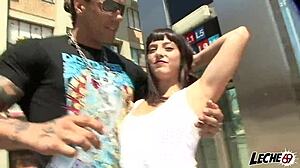 wet shirt brunette licks big cock outdoor in spanish scene