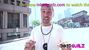 brunette tattooed girl gets facial cum on ink