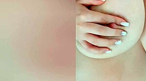 Busty beauty teases nipples on cam while parents sleep 😍