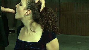 in the bdsm scene, the stockinged sub gets throatfucked by the maledom, choking and gagging in bondage