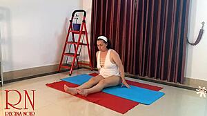 Regina noir practices nude yoga in the gym.