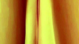 Honoka poses in skirt and panties with close-up on big ass