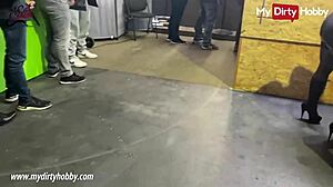 Busty Redhead Jerks Hard Cocks in Wild Gloryhole