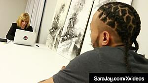 office boss sara jay interacts with her employees in a professional setting