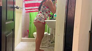 stepsister brushes teeth in shorts, showing nice ass